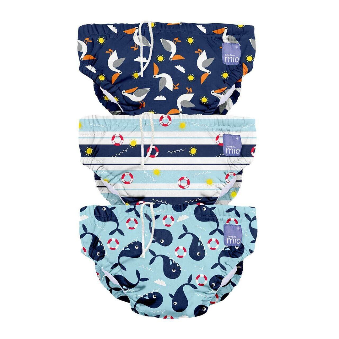 Reusable Swim Nappies Swimwear and Baby Essentials featuring colorful patterns for fun swimming.