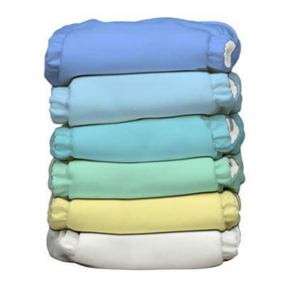 All in One Reusable Nappies and Baby Essentials stacked in various colors.