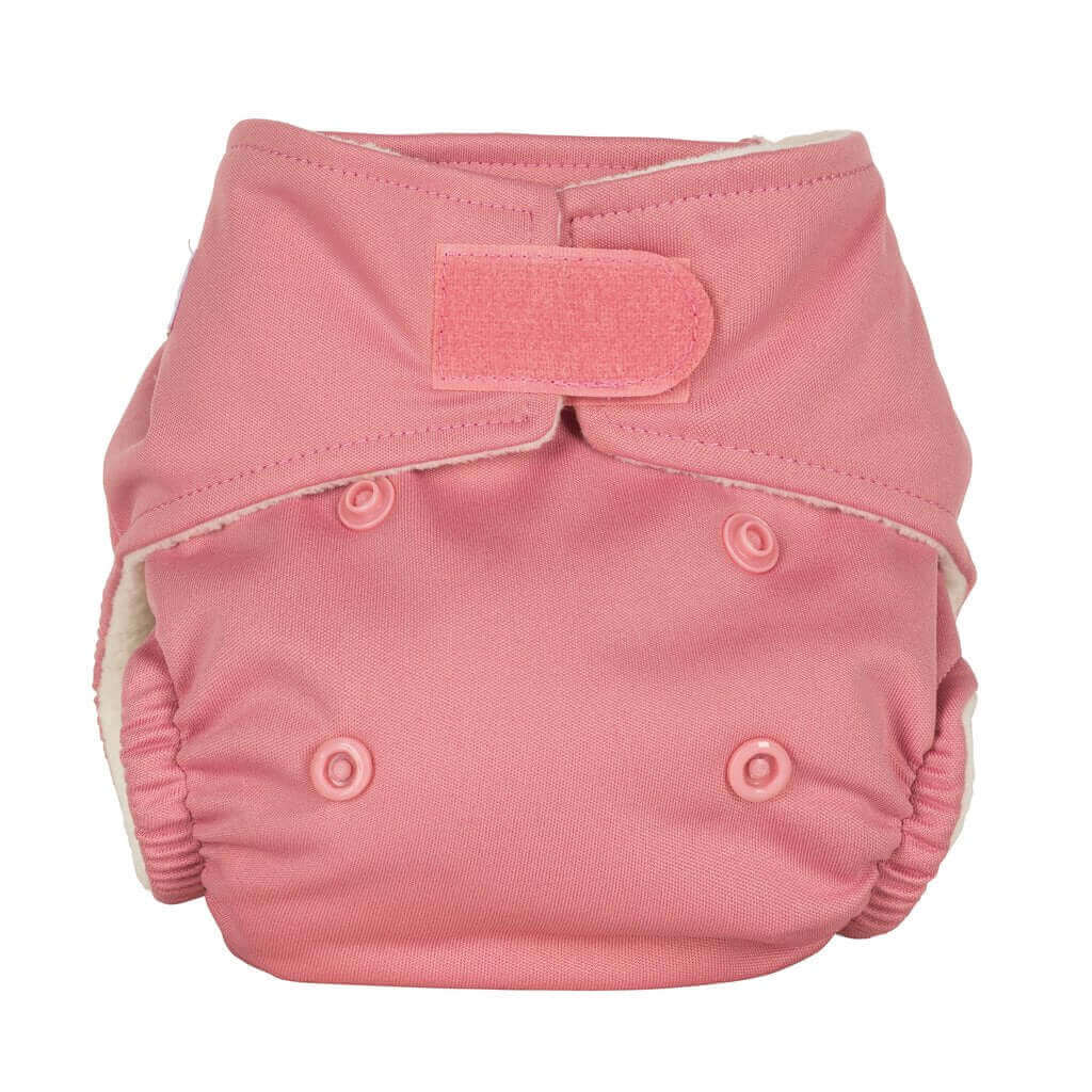 One Size Reusable Nappy in pink color with adjustable snaps and velcro, designed for comfort and versatility for babies.