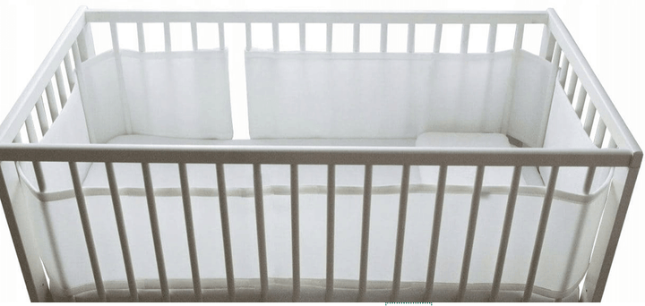 Baby Cot Bumper Half Length shown in a crib, featuring a stylish and safe design for infants.