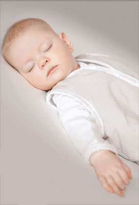 Baby sleeping peacefully in a Joey Swag Baby Sleeping Bag, showcasing its lightweight and safe design.