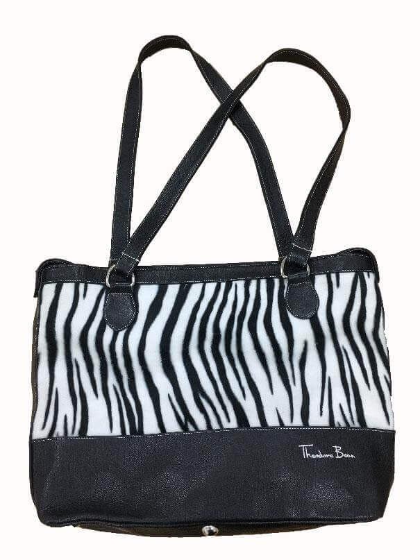 Baby Changing Bag Zebra Print with Mat featuring a stylish zebra pattern, lightweight design, and shoulder straps