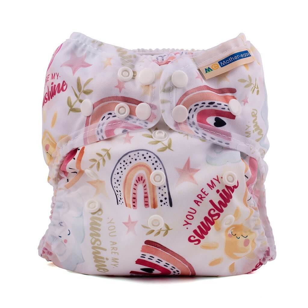 Wizard Uno Stay Dry Cloth Nappy - Newborn in colorful rainbow print with snaps for easy use.