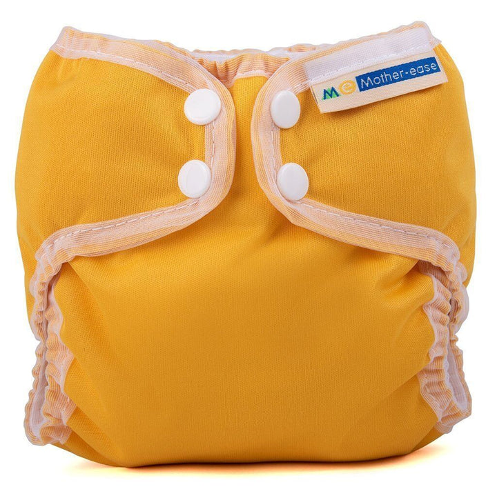Wizard Uno Stay Dry Cloth Nappy - Newborn in a vibrant yellow color with snap buttons for easy use.