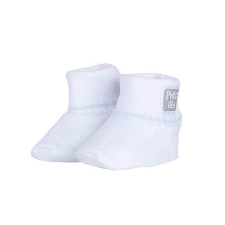 Newborn Pima Cotton Booties in white, soft and breathable, designed to keep baby's feet warm and prevent slipping.